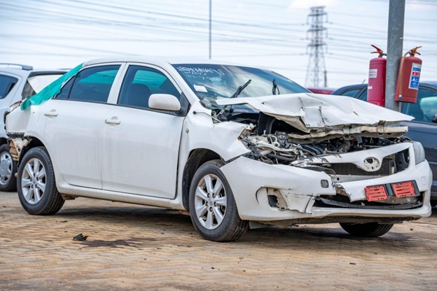 White damaged car sold to Sell Your Damaged Car