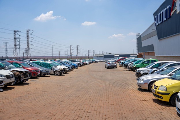 The Sell Your Damaged car yard filled with damaged cars.