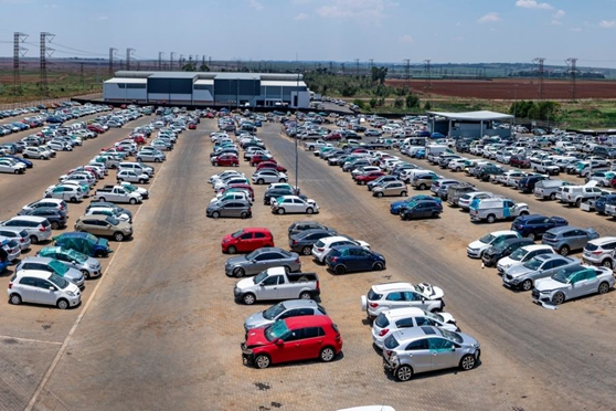 A crashed car is moved around the SYDC showroom